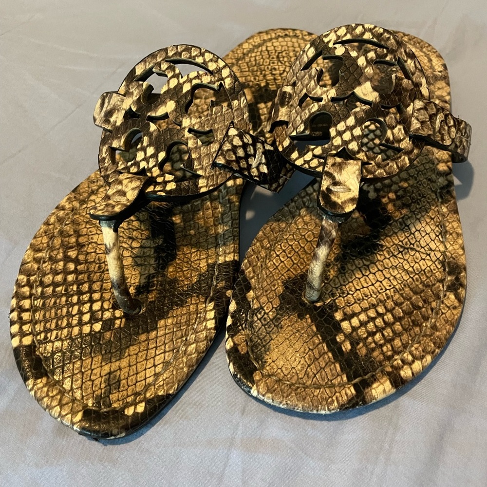 Lightly used Tory Burch flip flops in brown snakeskin